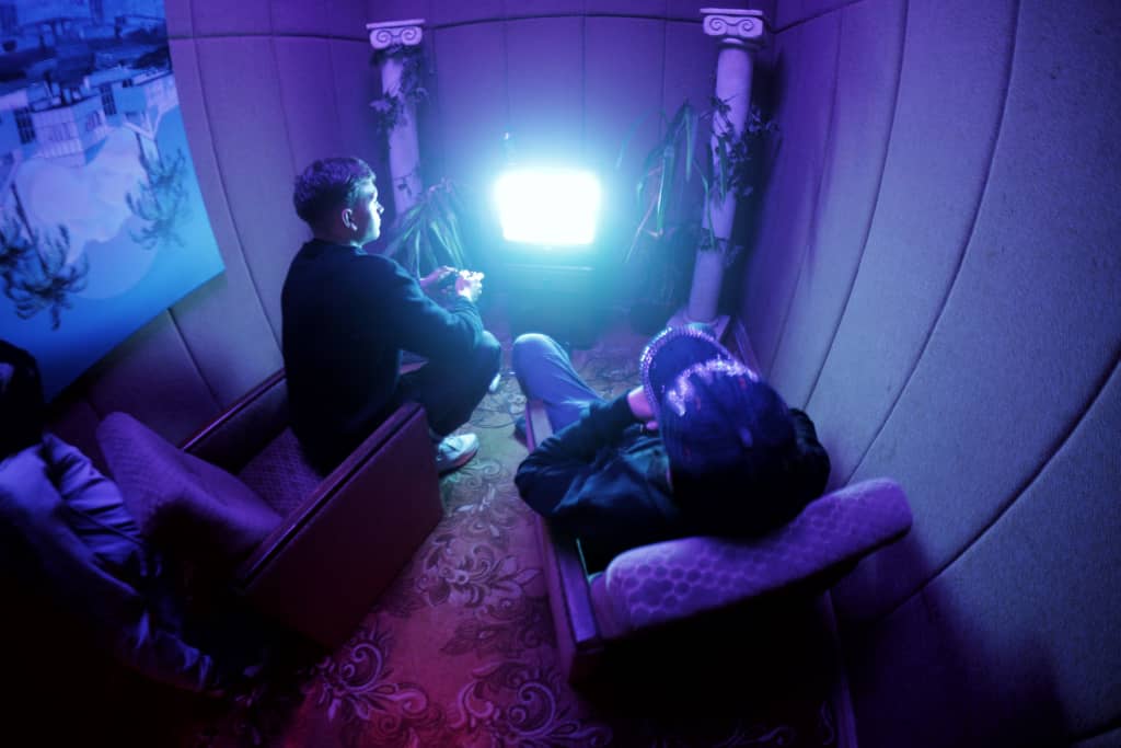 Gaming Room People playing old school games in vaporwave themed gaming room