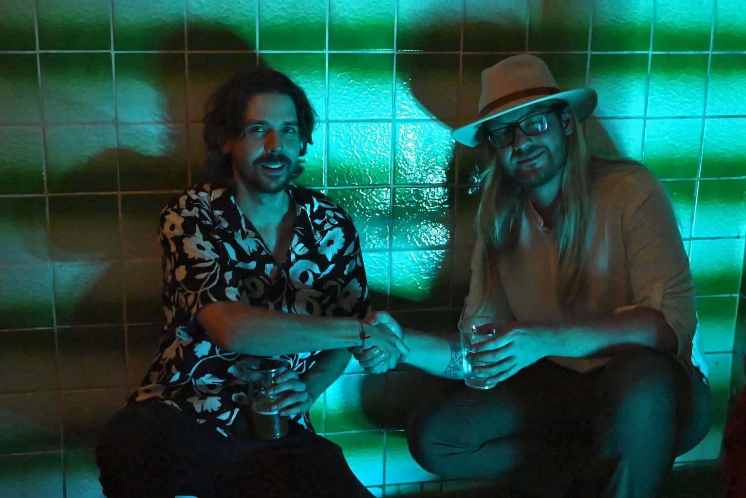 Handshake in The Pool Two people shaking hands on that sweet business deal