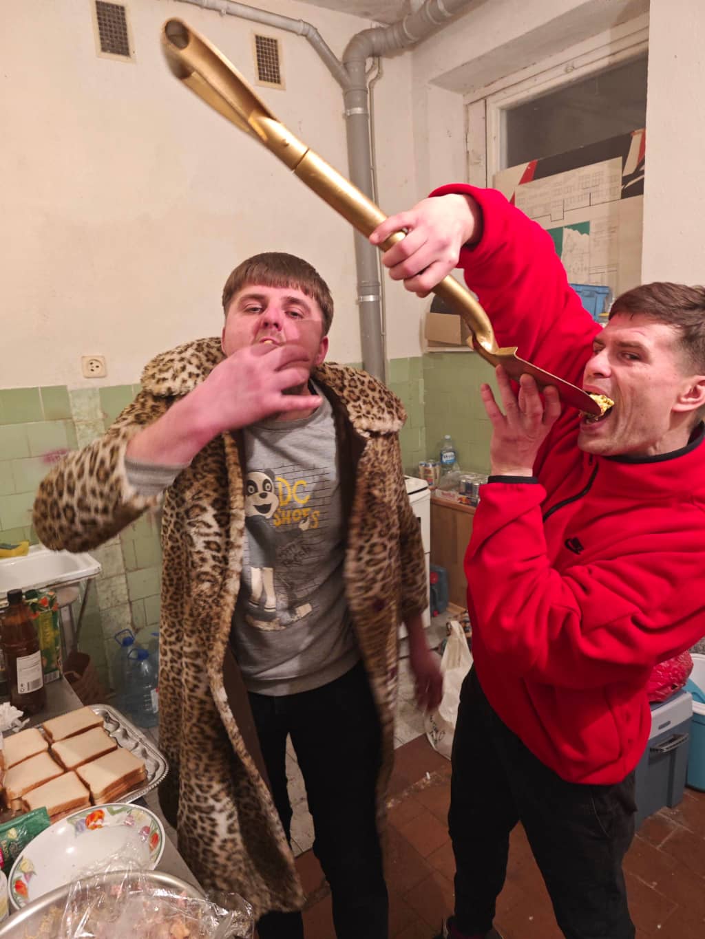 Gorg Gang (GG) Two people eating all the food in the kitchen using shovels and all kinds of instruments