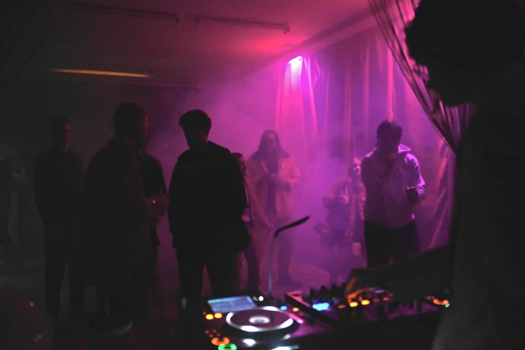 Pink Dancefloor People dancing in pink lighting