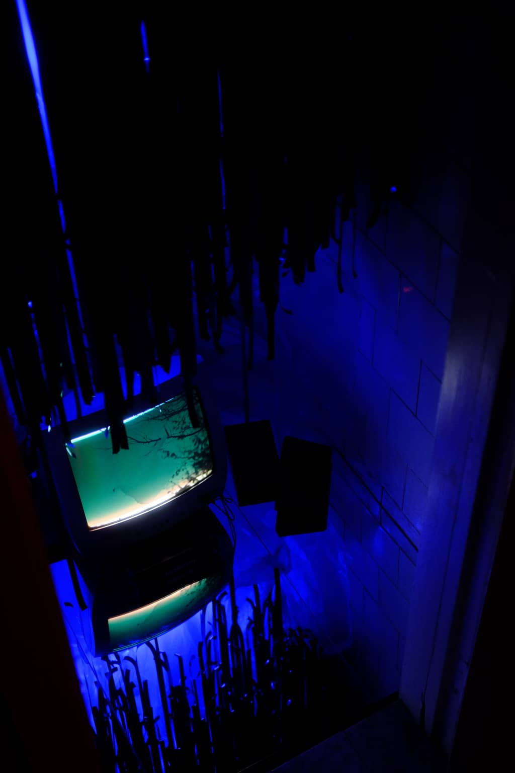 Pool Business (TV mode) Television placed in one of the showers next to the pool party