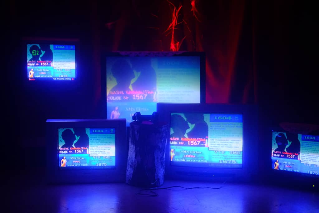 TVs Televisions showing commercials