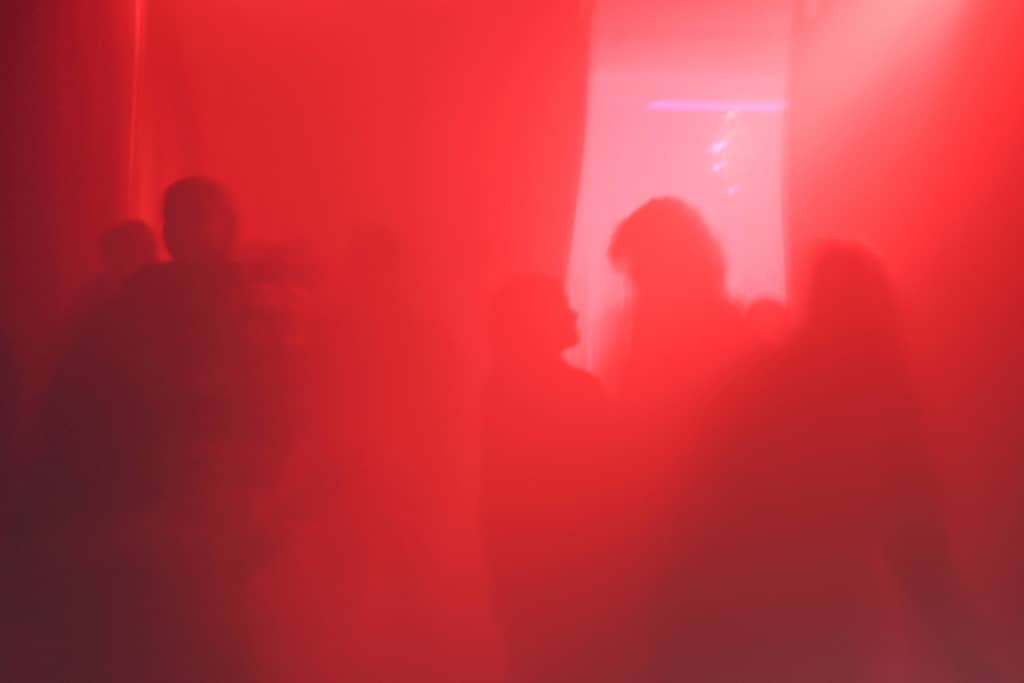 Heated Dance Floor Dance floor, bright red lights shining on the dancers