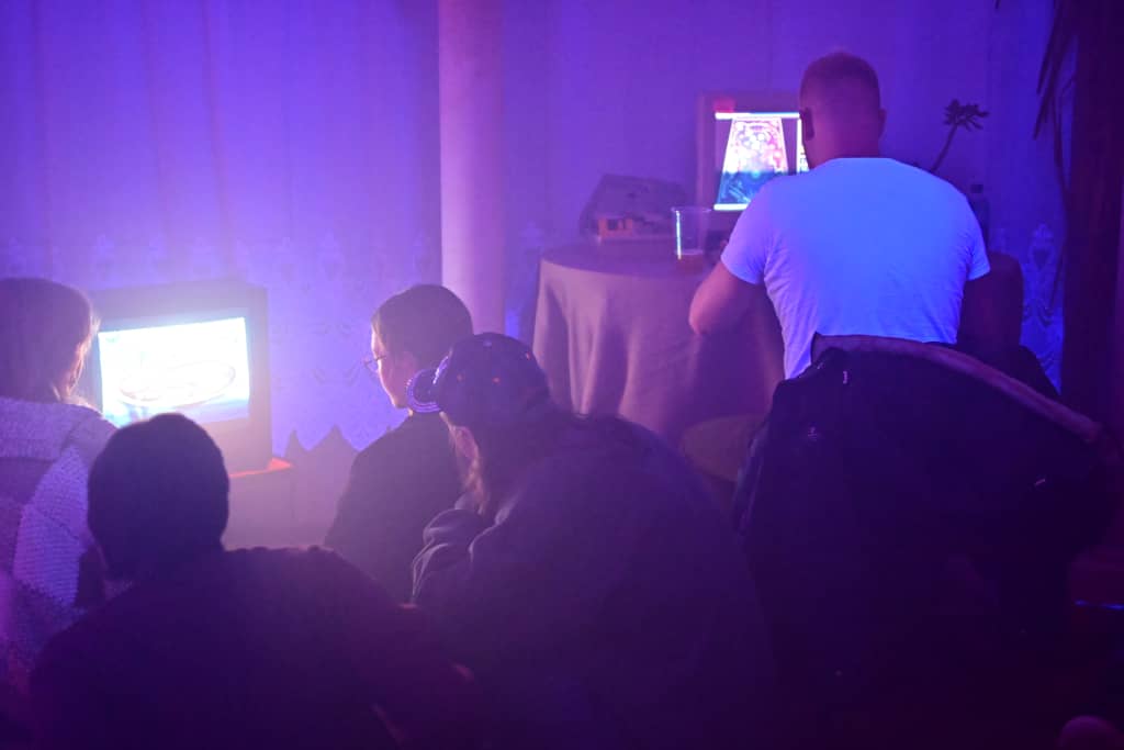 Gaming Mode Lots of people playing video games, co-op mode