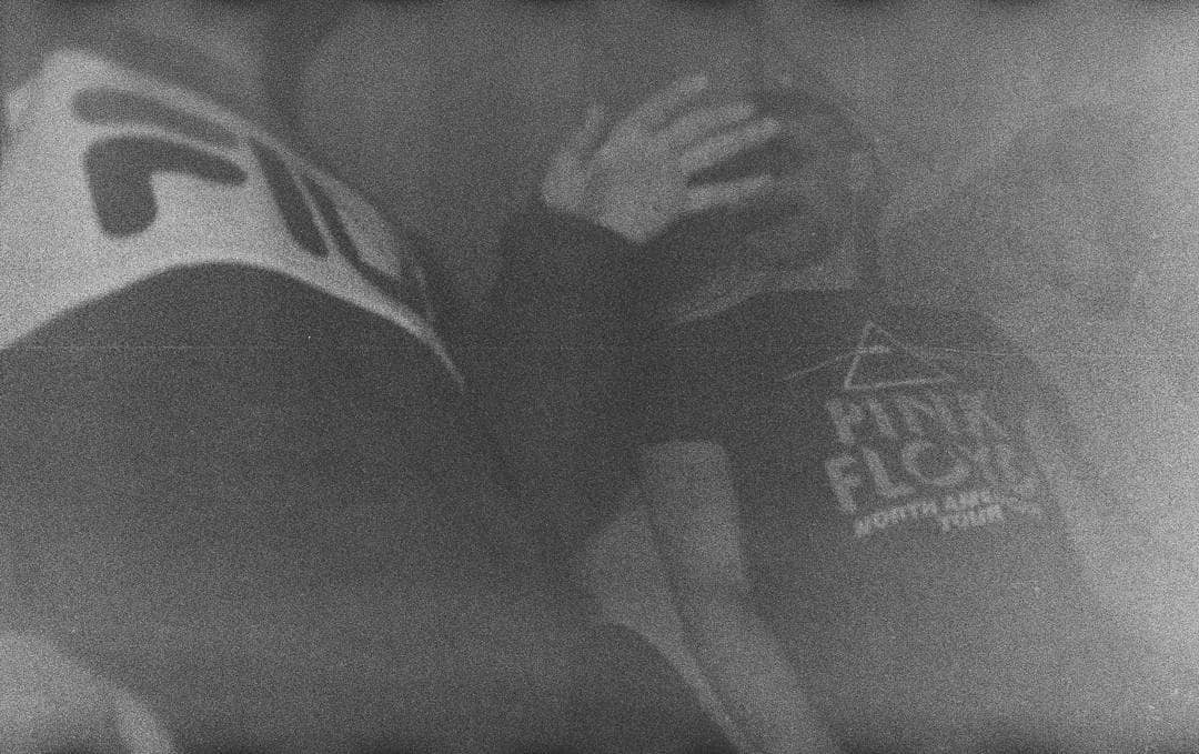 Funk Black and white picture of two people talking from an odd angle