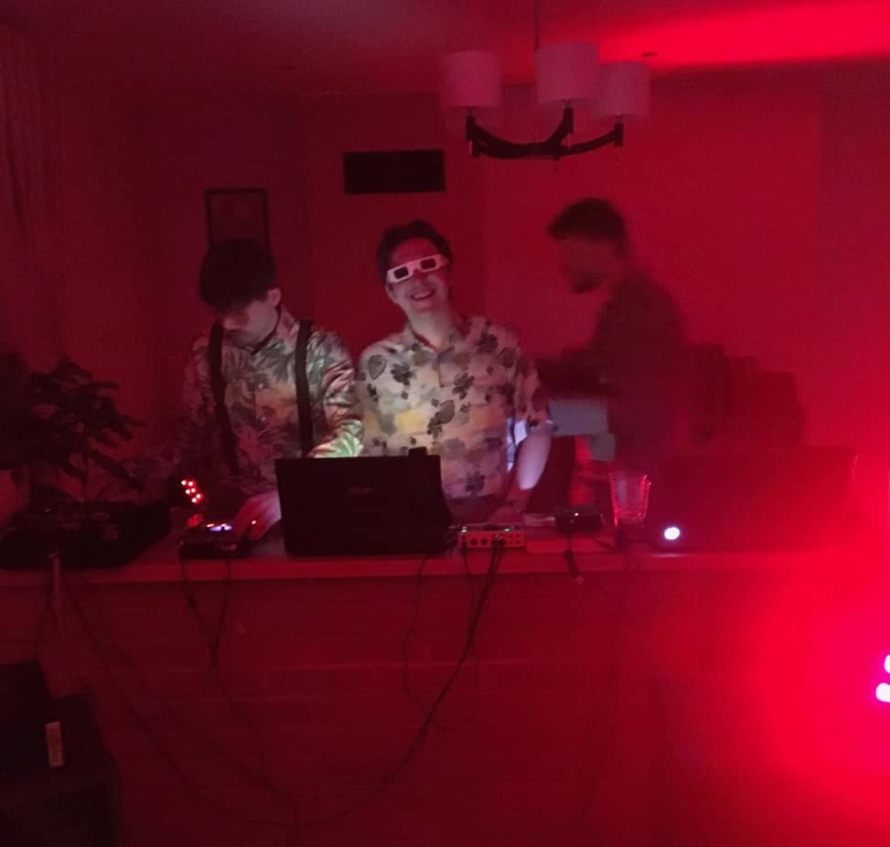 Main stage Two performers playing music behind a counter