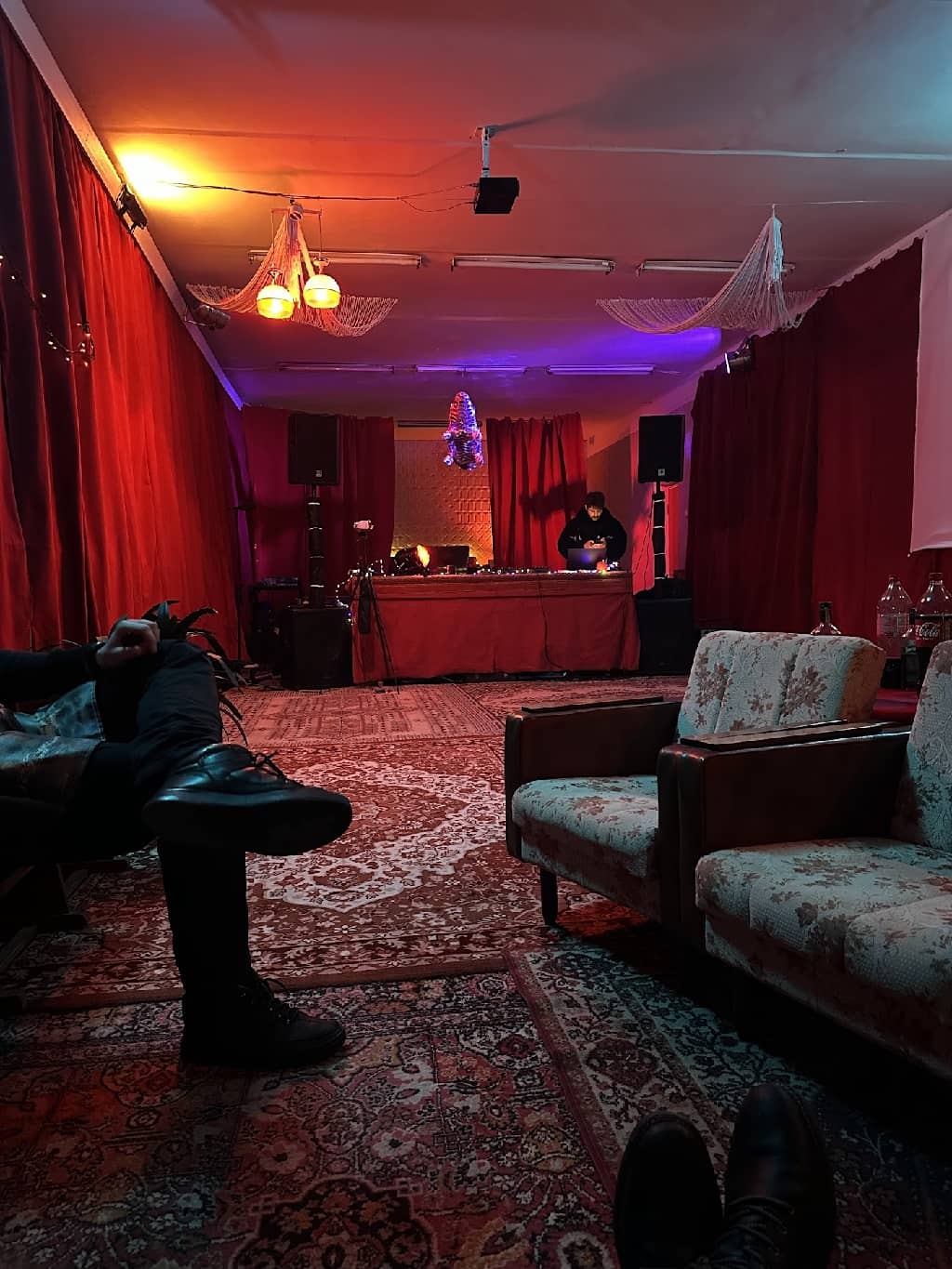 Dance floor with carpets and fancy chairs